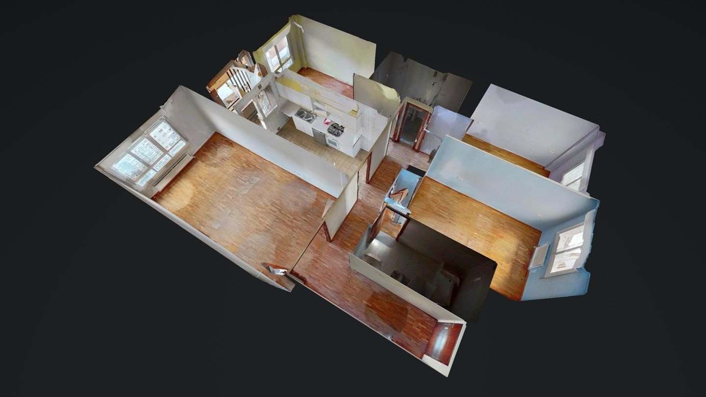Plano en tres dimensiones del piso con el salón, la cocina, tres dormitorios y dos baños